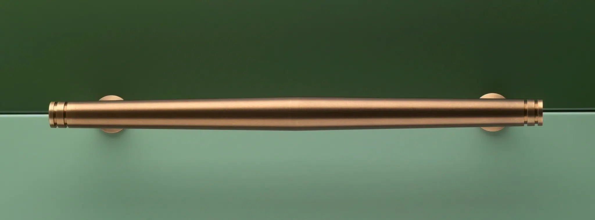 A bronze Crofts & Assinder handle